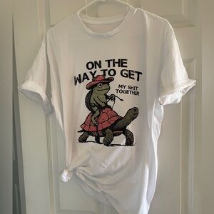 White Graphic T-Shirt with Turtle Design